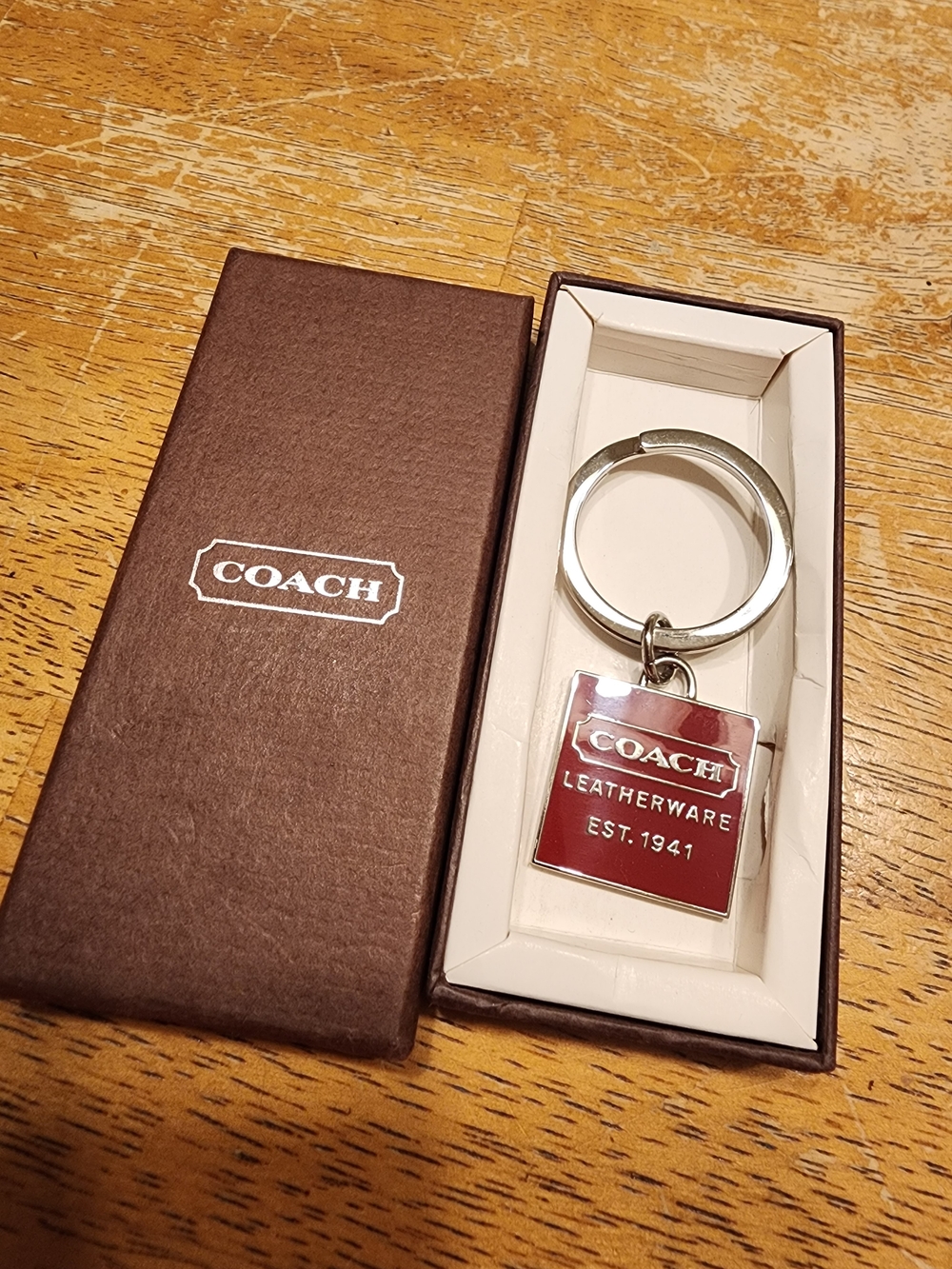 vintage Coach square charm keychain in dark red featuring silver-tone hardware